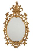 A modern Italian carved giltwood cartouche wall mirror