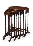 An Edwardian nest of mahogany quartetto tables