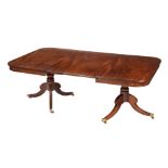 A Regency mahogany dining table