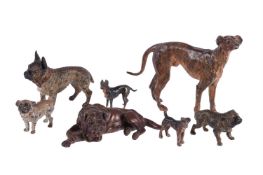 A group of bronze and cold painted bronze models of dogs