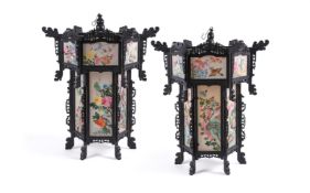 A large pair of Chinese wood and painted silk hanging lanterns