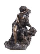 A resinous bronze group of a fawn and lady modelled in flagrante delicto