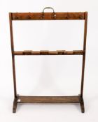A Victorian mahogany and softwood boot and whip rack