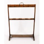 A Victorian mahogany and softwood boot and whip rack