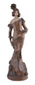 A large cold painted terracotta figure of a lady 'Fee aux Eaux'