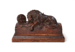 AFTER BERTEL THORVALDSEN AND AHORN, A CARVED WOOD MODEL OF THE LION OF LUCERNE, 19TH CENTURY