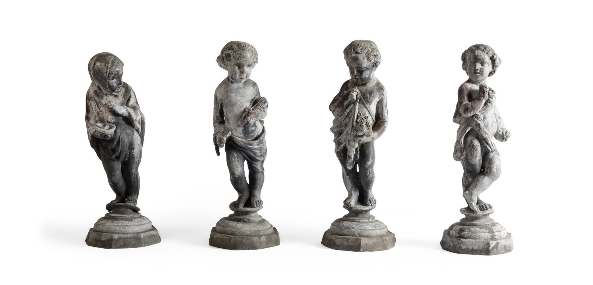 A SET OF FOUR LEAD FIGURES OF CHILDREN EMBLEMATIC OF THE SEASONS, EARLY/MID 20TH CENTURY