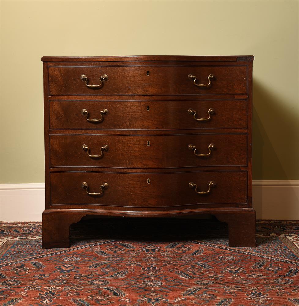 AN EARLY GEORGE III MAHOGANY SERPENTINE COMMODE, IN THE MANNER OF THOMAS CHIPPENDALE, CIRCA 1760 - Image 2 of 8