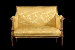 A FRENCH GILTWOOD AND YELLOW DAMASK UPHOLSTERED TWO-SEAT SOFA OR CANAPE, IN LOUIS XVI STYLE