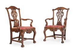 A THIRD PAIR OF CARVED WALNUT OPEN ARMCHAIRS PROBABLY PORTUGUESE, LATE 18TH CENTURY