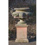 A LARGE STONE COMPOSITION TWIN HANDLED URN ON STAND, 20TH CENTURY