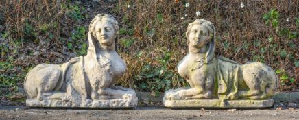 A PAIR OF CAST STONE FIGURES OF SPHINXES PROBABLY MID/LATE 19TH CENTURY, IN 18TH CENTURY STYLE