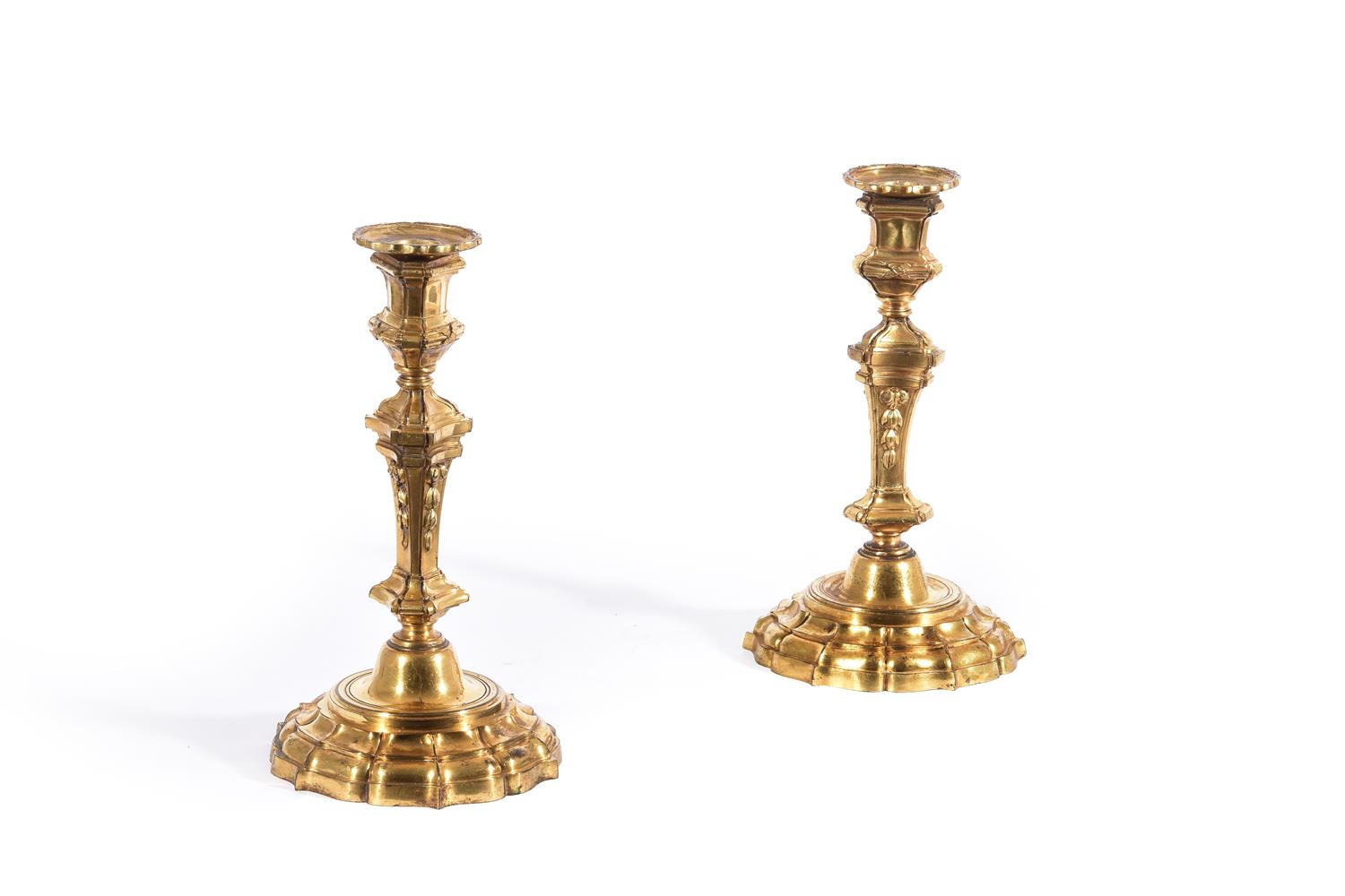 A PAIR OF ITALIAN ORMOLU CANDLESTICKS, EARLY 18TH CENTURY