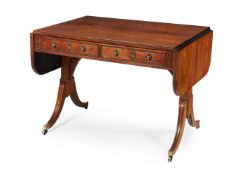 Y A REGENCY ROSEWOOD AND GILT METAL MOUNTED SOFA TABLE IN THE MANNER OF JOHN MCLEAN, CIRCA 1810-1815