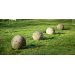 A SET OF FOUR CORNISH GRANITE BALLS, 20TH CENTURY