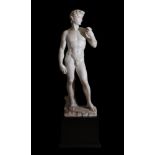 AFTER MICHELANGELO (ITALIAN, 1475-1564), A CARVED MARBLE FIGURE OF 'DAVID', EARLY 20TH CENTURY