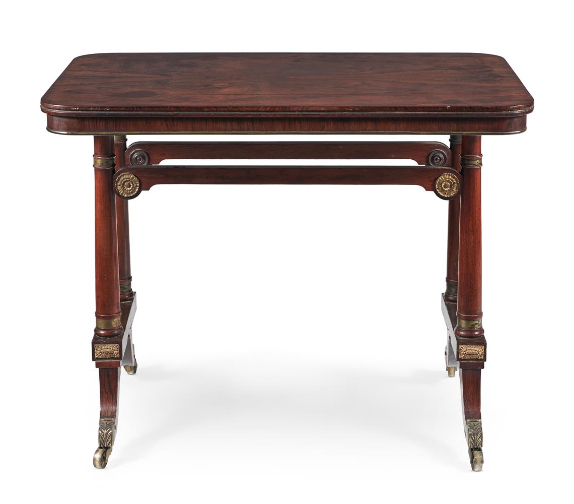 Y A REGENCY ROSEWOOD AND GILT METAL MOUNTED LIBRARY TABLE, IN THE MANNER OF MORGAN AND SANDERS