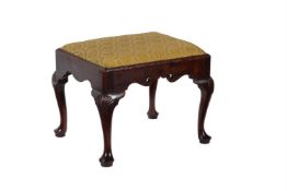 A GEORGE II WALNUT STOOL, CIRCA 1730