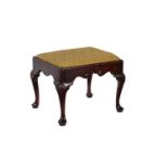 A GEORGE II WALNUT STOOL, CIRCA 1730