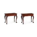 A PAIR OF GEORGE II MAHOGANY CONCERTINA ACTION FOLDING CARD TABLES PROBABLY IRISH