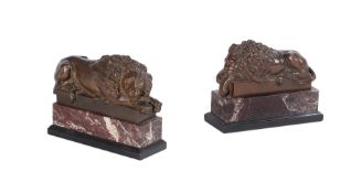 AFTER ANTONIO CANOVA, A NEAR PAIR OF BRONZE MODELS OF RECLINING LIONS, LATE 19TH CENTURY