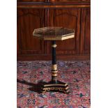 A REGENCY EBONISED, PARCEL GILT AND GILTMETAL MOUNTED PEDESTAL TABLE, CIRCA 1815