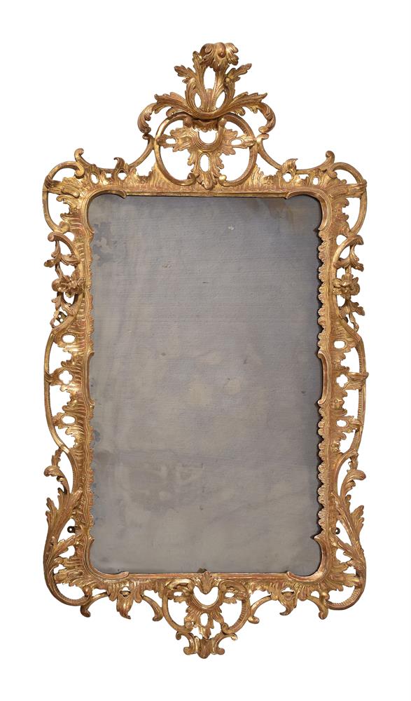 A GEORGE II CARVED GILTWOOD WALL MIRROR, CIRCA 1750