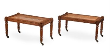 A PAIR OF BROWN OAK HALL SEATS OR LUGGAGE STANDS, IN THE MANNER OF GEORGE BULLOCK