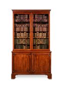 A GEORGE III MAHOGANY CABINET BOOKCASE, IN THE MANNER OF HENRY KETTLE