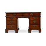 A GEORGE II MAHOGANY PARTNER'S PEDESTAL DESK, CIRCA 1750