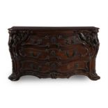 A LARGE FRENCH OR FLEMISH CARVED OAK COMMODE, POSSIBLY LIEGE, MID 18TH CENTURY