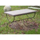 A STONE TOPPED IRON BASE GARDEN TABLE, EARLY 20TH CENTURY