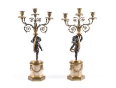 A PAIR OF FRENCH BRONZE AND GILT METAL THREE-LIGHT CANDELABRA, LATE 19TH CENTURY