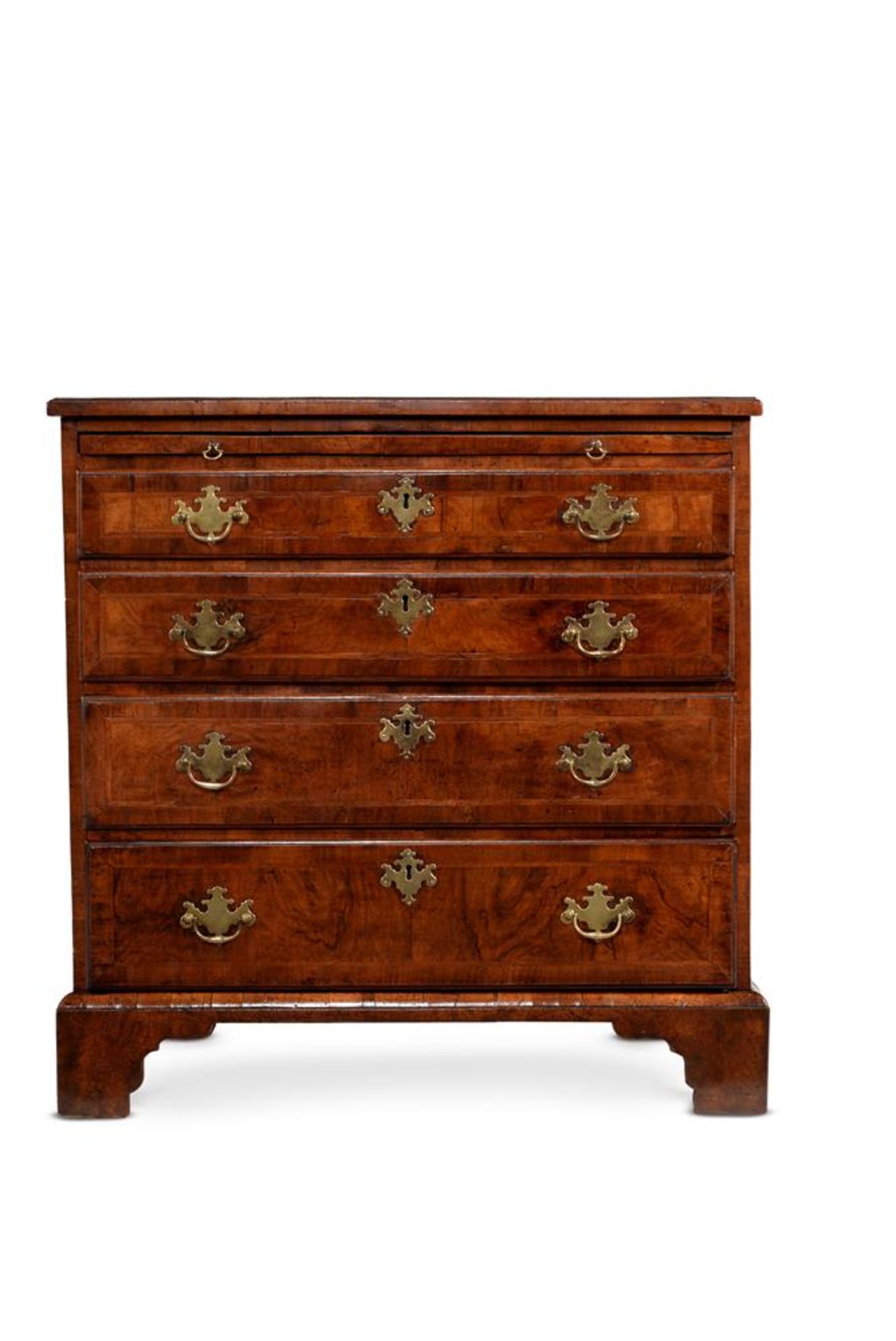 A GEORGE II WALNUT AND FEATHERBANDED CHEST OF DRAWERS, SECOND QUARTER 18TH CENTURY