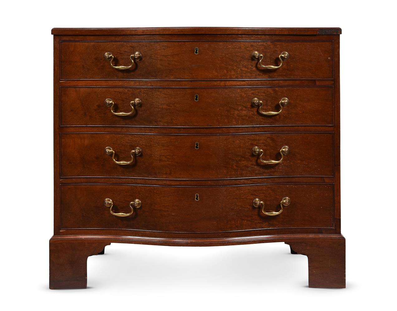 AN EARLY GEORGE III MAHOGANY SERPENTINE COMMODE, IN THE MANNER OF THOMAS CHIPPENDALE, CIRCA 1760