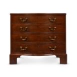 AN EARLY GEORGE III MAHOGANY SERPENTINE COMMODE, IN THE MANNER OF THOMAS CHIPPENDALE, CIRCA 1760