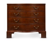AN EARLY GEORGE III MAHOGANY SERPENTINE COMMODE, IN THE MANNER OF THOMAS CHIPPENDALE, CIRCA 1760