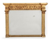 A REGENCY GILTWOOD OVERMANTLE MIRROR, IN CORINTHIAN STYLE, CIRCA 1820