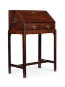 A GEORGE II MAHOGANY BUREAU ON STAND, IN THE MANNER OF THOMAS CHIPPENDALE, CIRCA 1750