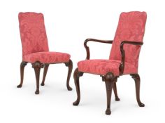 A SET OF TWENTY WALNUT AND UPHOLSTERED DINING CHAIRS, IN GEORGE II STYLE