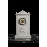 A CONTINENTAL CARRARA MARBLE CASED CLOCK, IN THE MANNER OF BERTEL THORVALDSEN, EARLY 19TH CENTURY