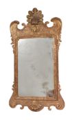 A CARVED GILTWOOD WALL MIRROR, IN GEORGE II STYLE, EARLY 20TH CENTURY