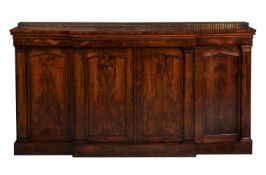 Y A GEORGE IV ROSEWOOD BREAKFRONT SIDE CABINET, CIRCA 1825