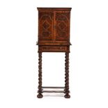 A CHARLES II YEW OYSTER VENEERED AND HOLLY BANDED CABINET