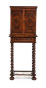 A CHARLES II YEW OYSTER VENEERED AND HOLLY BANDED CABINET