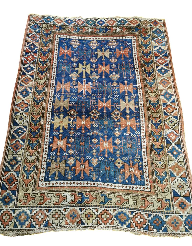 A CAUCASIAN RUG, PROBABLY KUBA, approximately 140 x 104cm