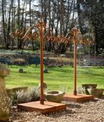 A LARGE PAIR OF WROUGHT IRON GARDEN OR STABLES HANGERS, PROBABLY 20TH CENTURY