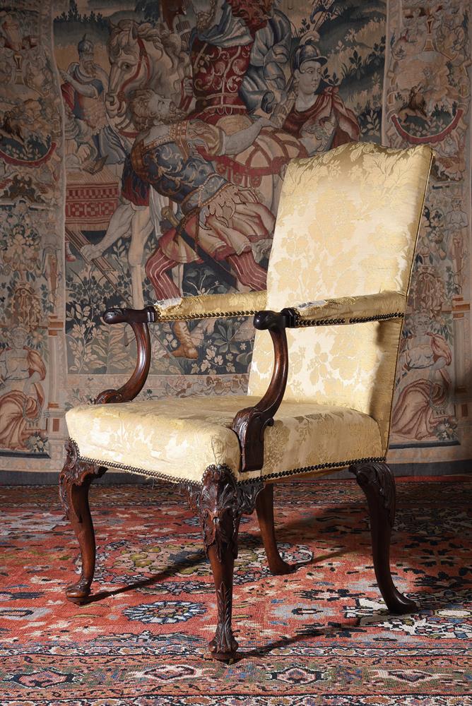 A GEORGE II CARVED WALNUT OPEN ARMCHAIR, CIRCA 1740