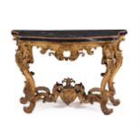 A CONTINENTAL CARVED GILTWOOD SERPENTINE CONSOLE TABLE PROBABLY ITALIAN