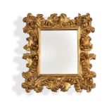 AN ITALIAN CARVED GILTWOOD WALL MIRROR, POSSIBLY FLORENTINE, 18TH CENTURY
